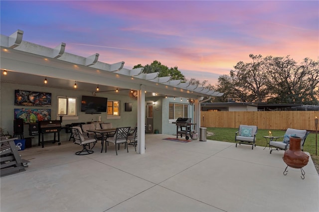 view of patio / terrace featuring area for grilling, a pergola, outdoor dining area, and fence