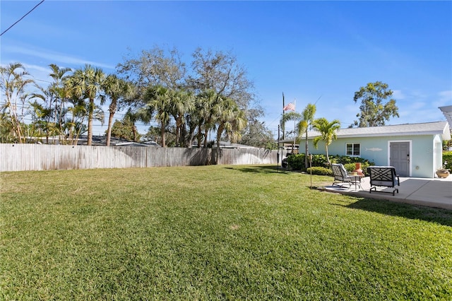 view of yard featuring a patio and fence private yard