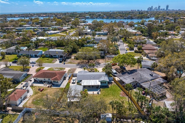 bird's eye view with a residential view and a water view