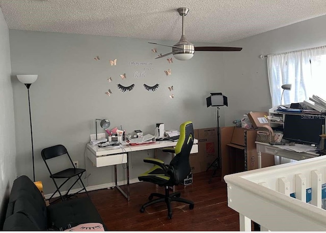 office with a textured ceiling, dark wood-type flooring, and ceiling fan