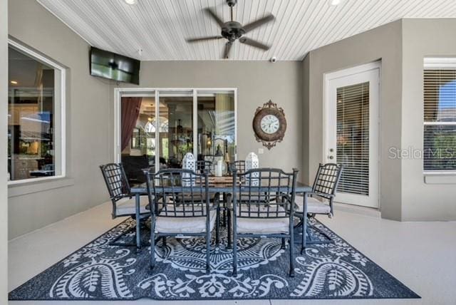 view of patio / terrace with outdoor dining space and a ceiling fan