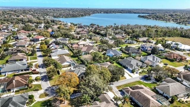 bird's eye view featuring a residential view and a water view