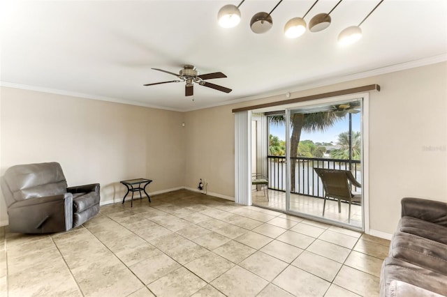 unfurnished room with ceiling fan, light tile patterned flooring, baseboards, and ornamental molding