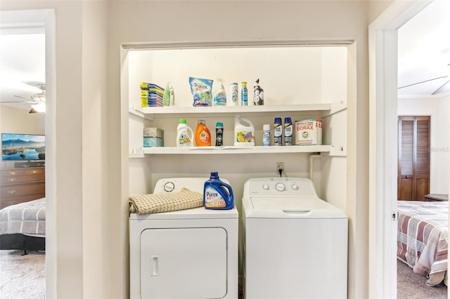 laundry area featuring washer and dryer, carpet floors, a ceiling fan, and laundry area