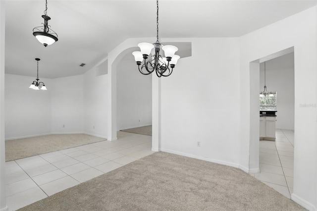 unfurnished dining area with light tile patterned floors, a notable chandelier, and light colored carpet