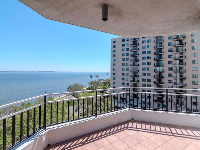 balcony featuring a water view