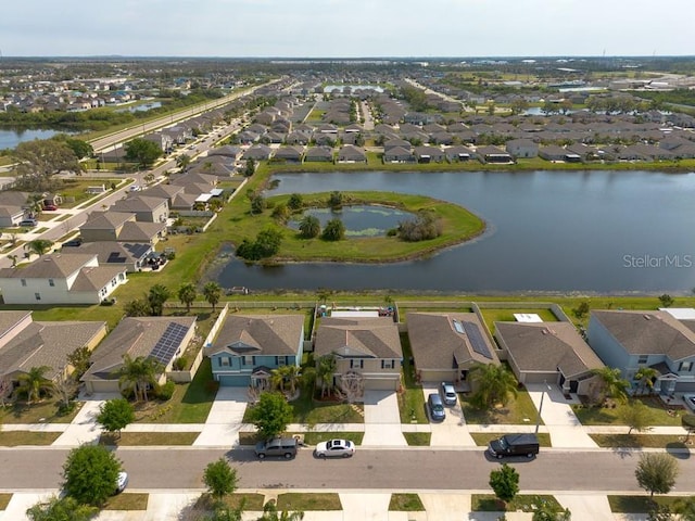 aerial view featuring a residential view and a water view