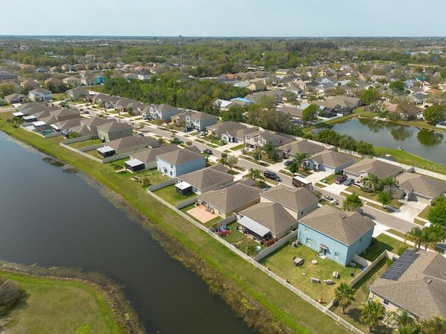 aerial view with a residential view and a water view