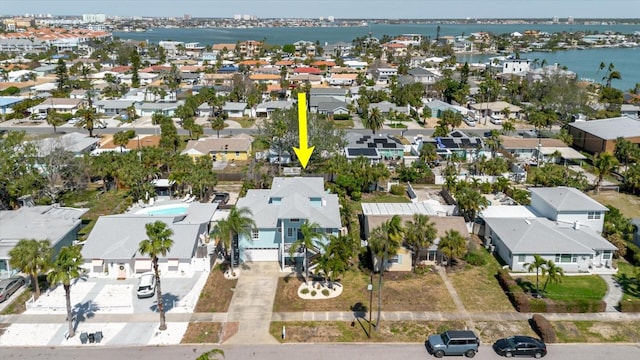 aerial view with a residential view and a water view