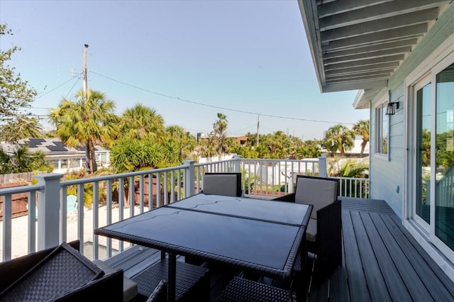 deck featuring outdoor dining area