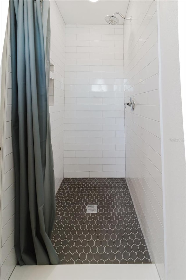 full bathroom with a stall shower