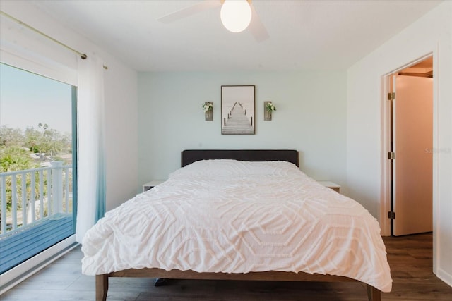 bedroom with multiple windows, a ceiling fan, and wood finished floors