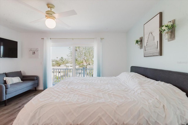 bedroom with wood finished floors, ceiling fan, and access to outside