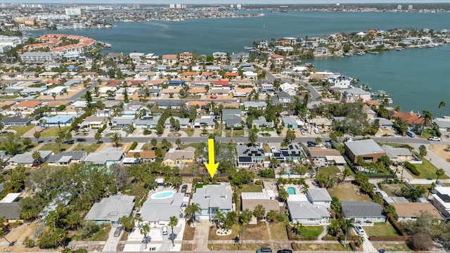 aerial view with a residential view and a water view