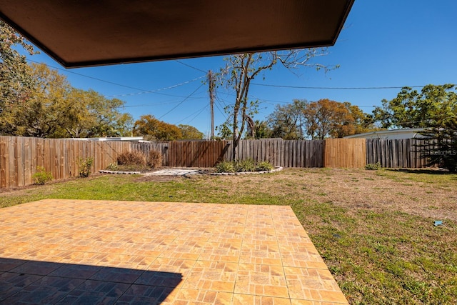 view of patio featuring a fenced backyard