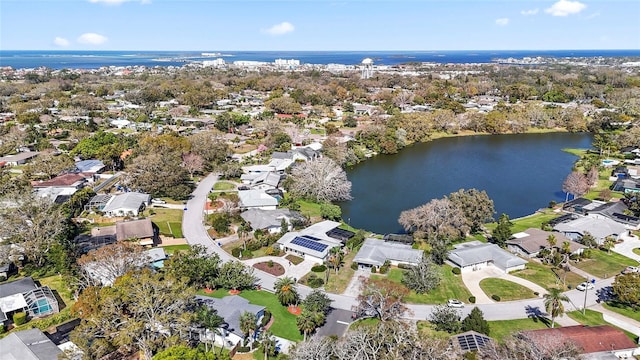 aerial view with a residential view and a water view