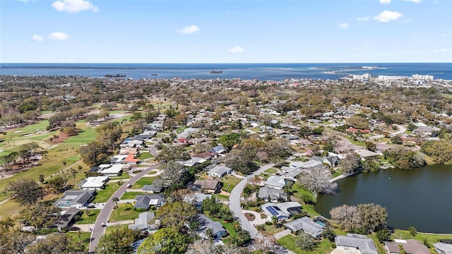 birds eye view of property featuring a residential view and a water view