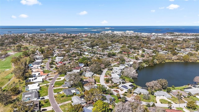 bird's eye view featuring a residential view and a water view