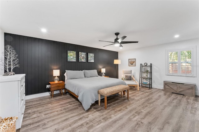 bedroom featuring recessed lighting, baseboards, light wood-style flooring, and a ceiling fan