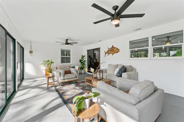 living room featuring visible vents