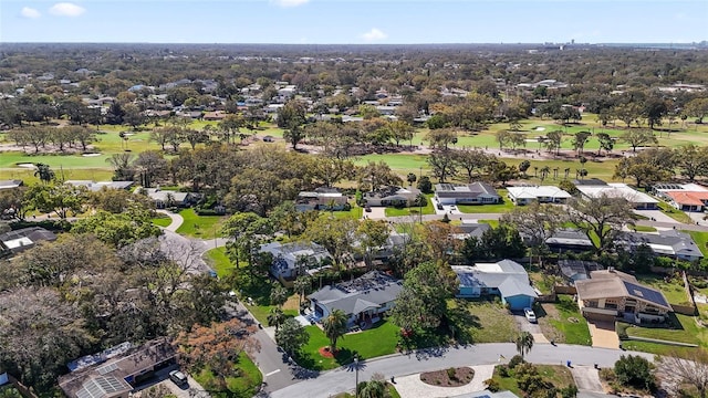 aerial view featuring a residential view and view of golf course