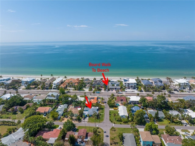 aerial view with a residential view and a water view