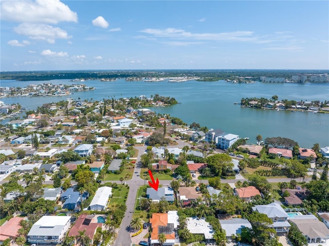 bird's eye view featuring a residential view and a water view