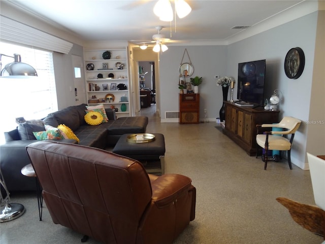 living room featuring visible vents, baseboards, ceiling fan, and crown molding