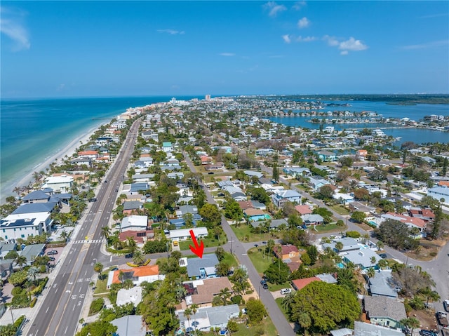 bird's eye view with a residential view and a water view