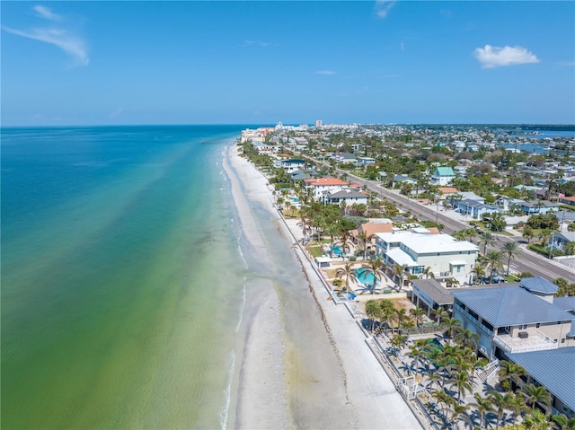 bird's eye view with a view of the beach and a water view