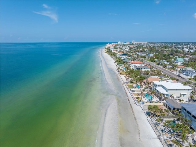 aerial view featuring a water view and a view of the beach