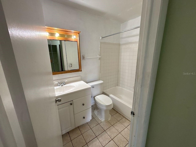 bathroom with tile patterned floors, shower / bath combination, toilet, and vanity