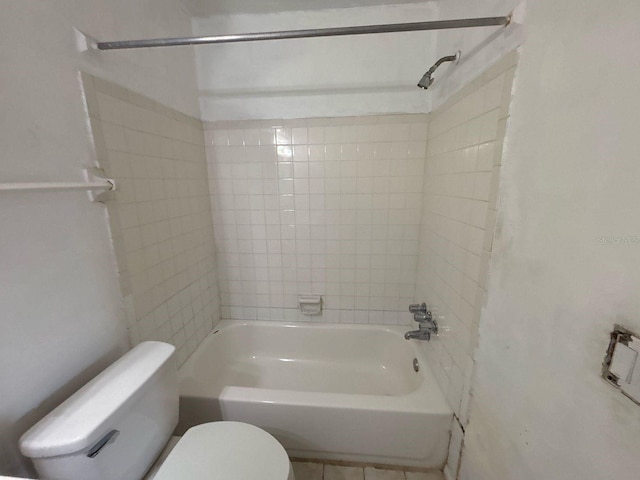 bathroom featuring toilet and shower / bathing tub combination