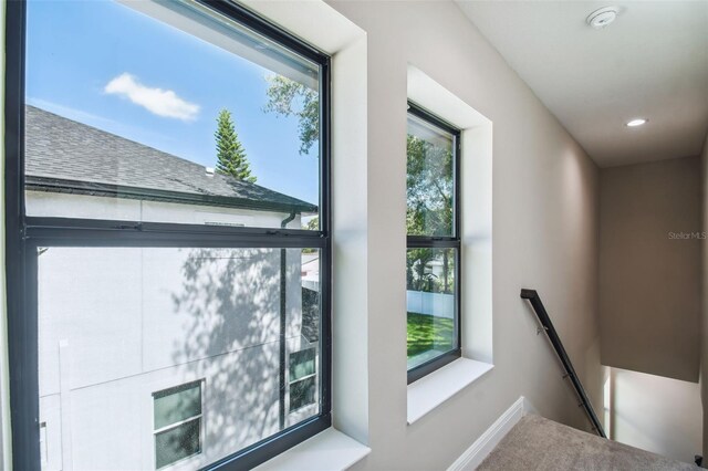 details featuring recessed lighting and baseboards