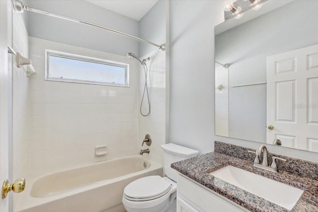 full bath featuring tub / shower combination, toilet, and vanity