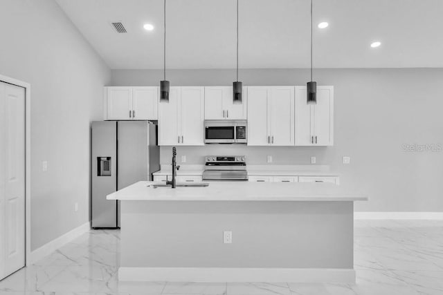 kitchen with visible vents, marble finish floor, appliances with stainless steel finishes, and a sink