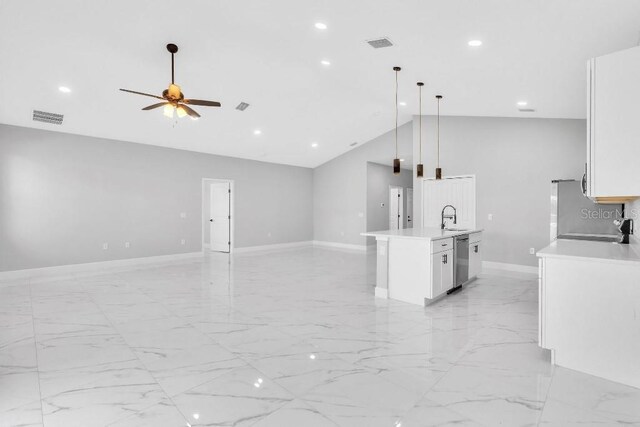 unfurnished living room with visible vents, baseboards, ceiling fan, and a sink