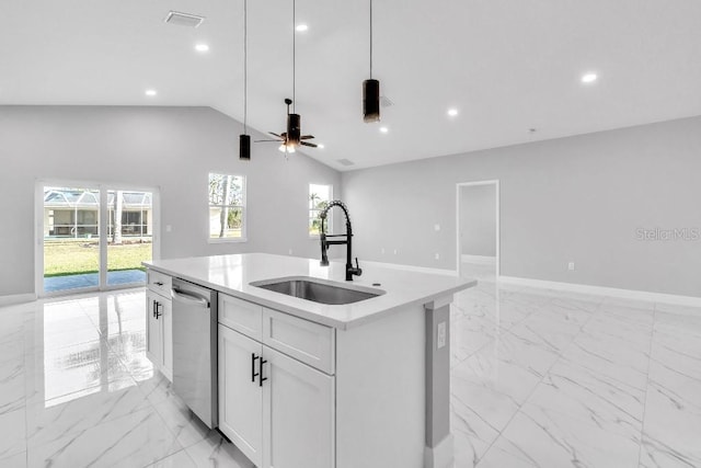 kitchen with open floor plan, stainless steel dishwasher, and a sink