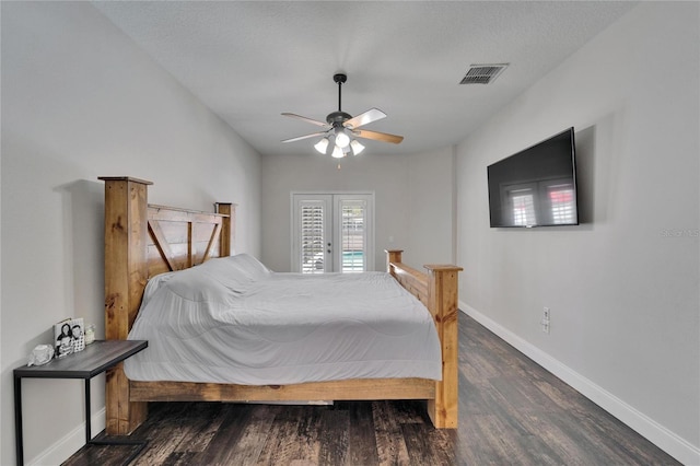 bedroom with visible vents, wood finished floors, french doors, baseboards, and ceiling fan