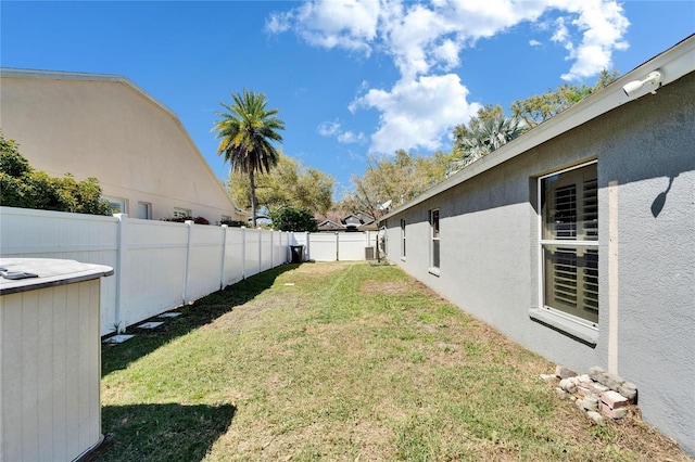 view of yard featuring a fenced backyard