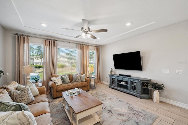 living area with recessed lighting, baseboards, ceiling fan, and wood tiled floor