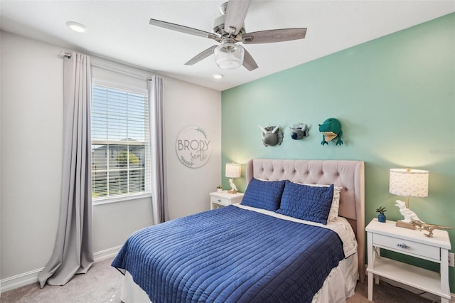 carpeted bedroom featuring recessed lighting, baseboards, and a ceiling fan