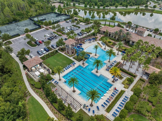 birds eye view of property featuring a water view