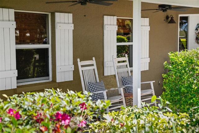 doorway to property with ceiling fan