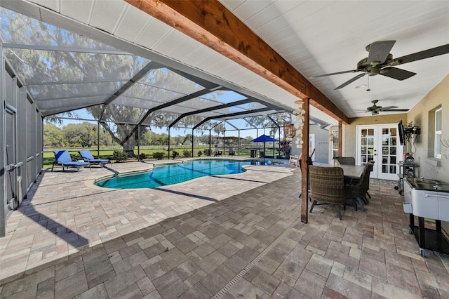 outdoor pool featuring a patio, french doors, a lanai, and ceiling fan