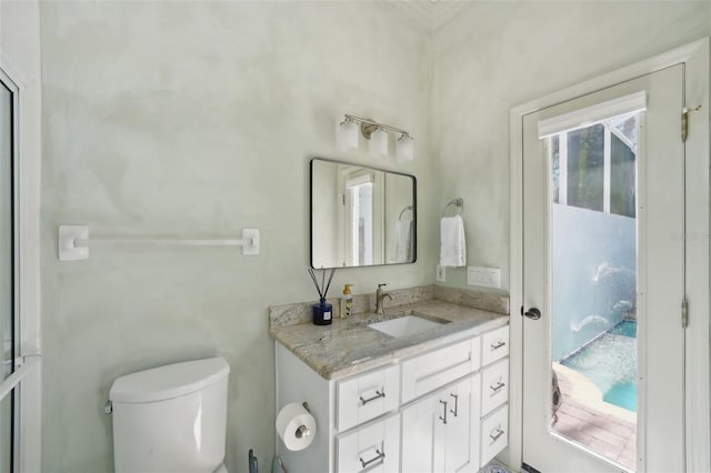 bathroom with vanity and toilet