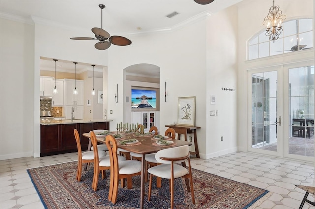 dining area featuring visible vents, french doors, and crown molding