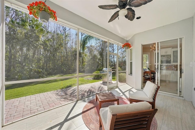 sunroom with a wealth of natural light and ceiling fan