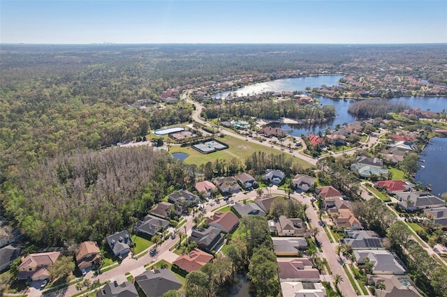 bird's eye view with a water view and a residential view