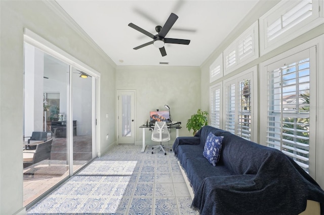 sunroom / solarium featuring visible vents and ceiling fan